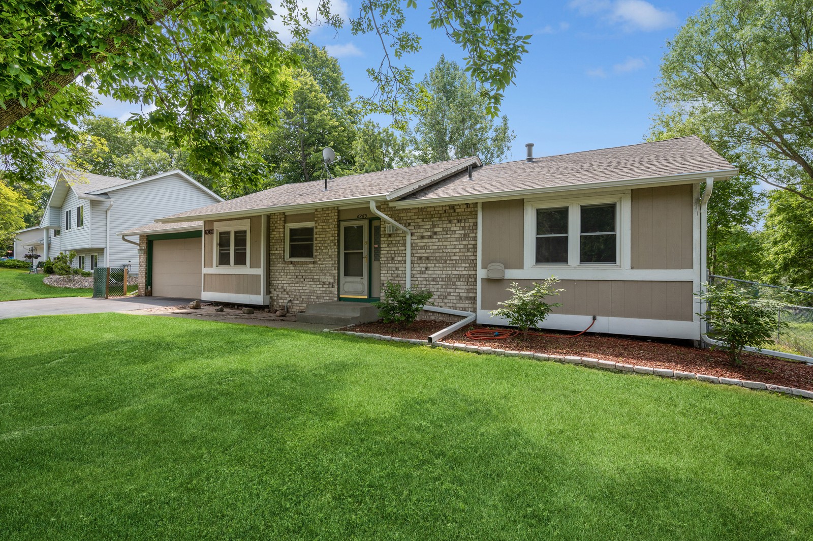 Front view of Blossom Hill Assisted Living in Woodbury, MN, featuring a welcoming entrance and landscaped garden